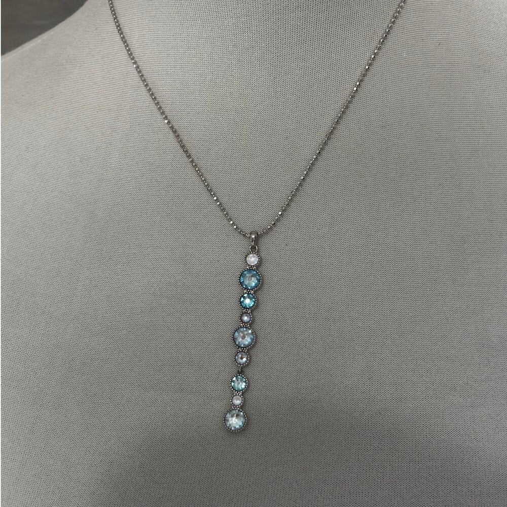Swarovski Touchstone Crystal silvertone, graduated blue white lariat pendant